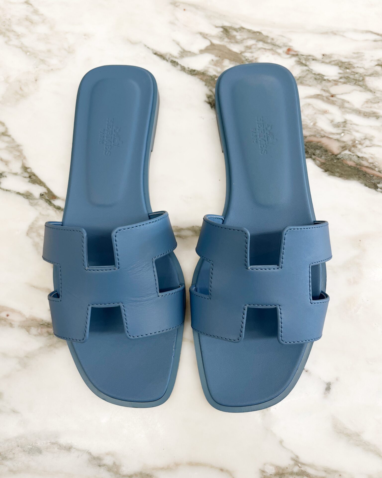 Hermes leather Oran sandal in light blue