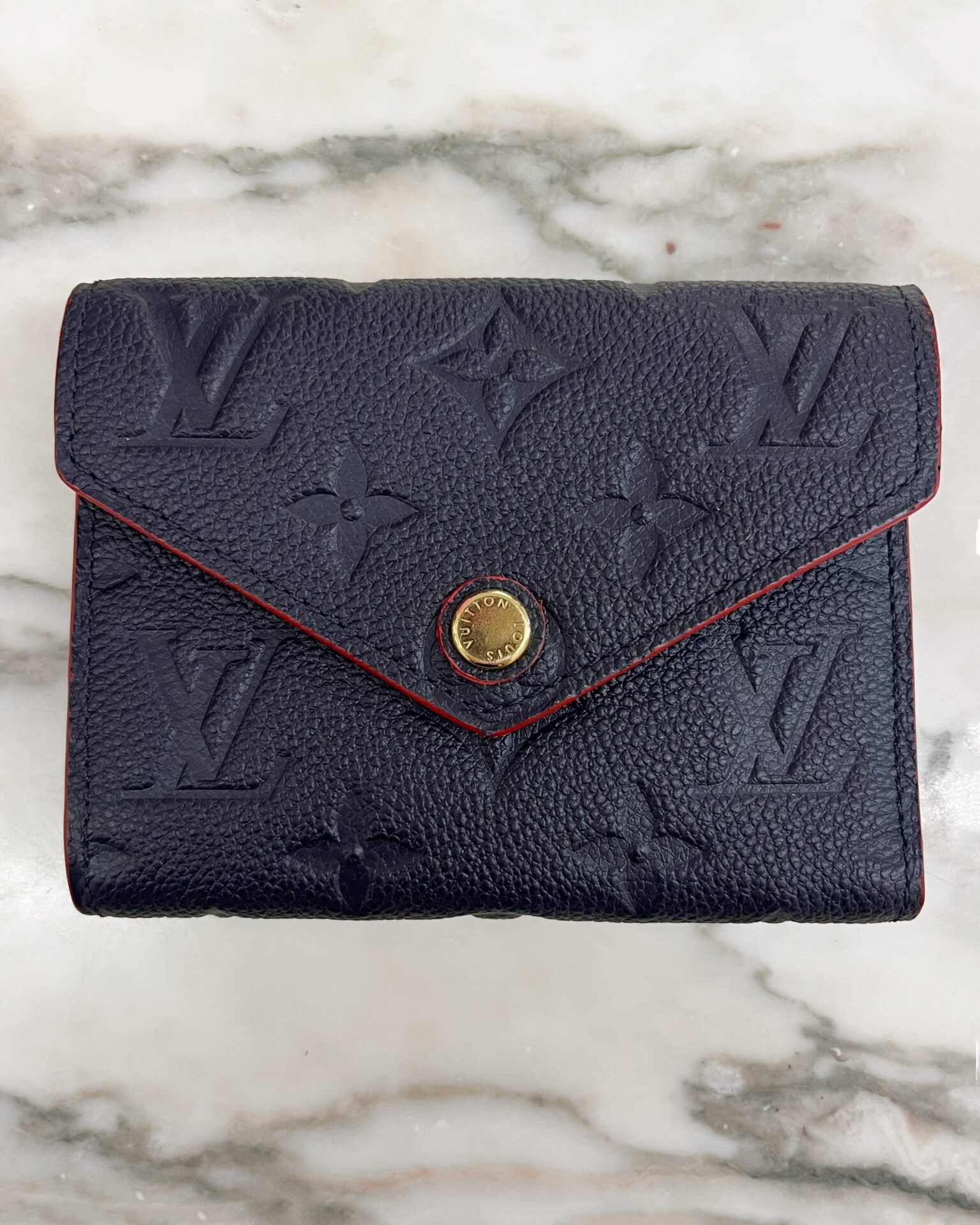 Louis Vuitton 2017 navy Monogram Empreinte leather Victorine wallet