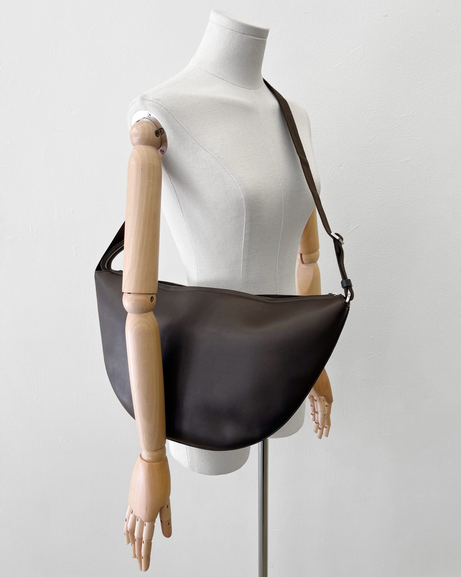 The Row Crescent Bag in chocolate leather