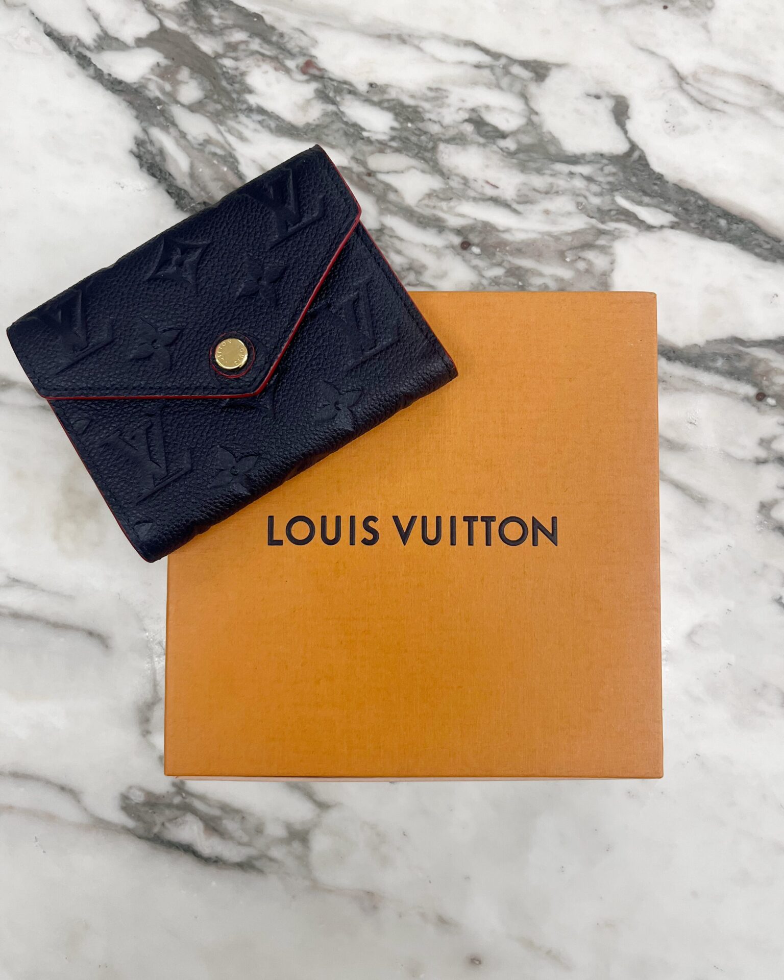 Louis Vuitton 2017 navy Monogram Empreinte leather Victorine wallet