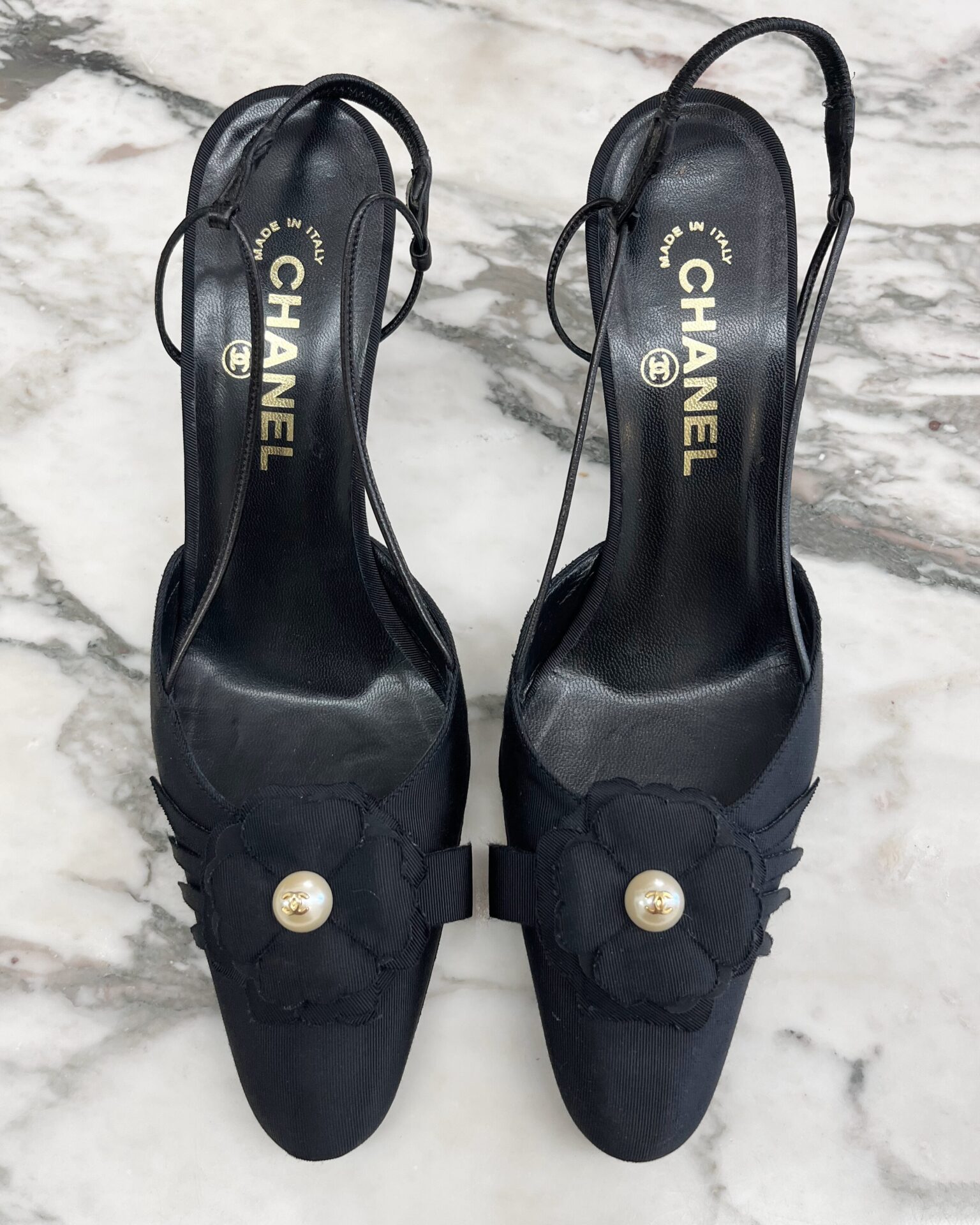 Chanel black slingback heels with Camellia and pearl
