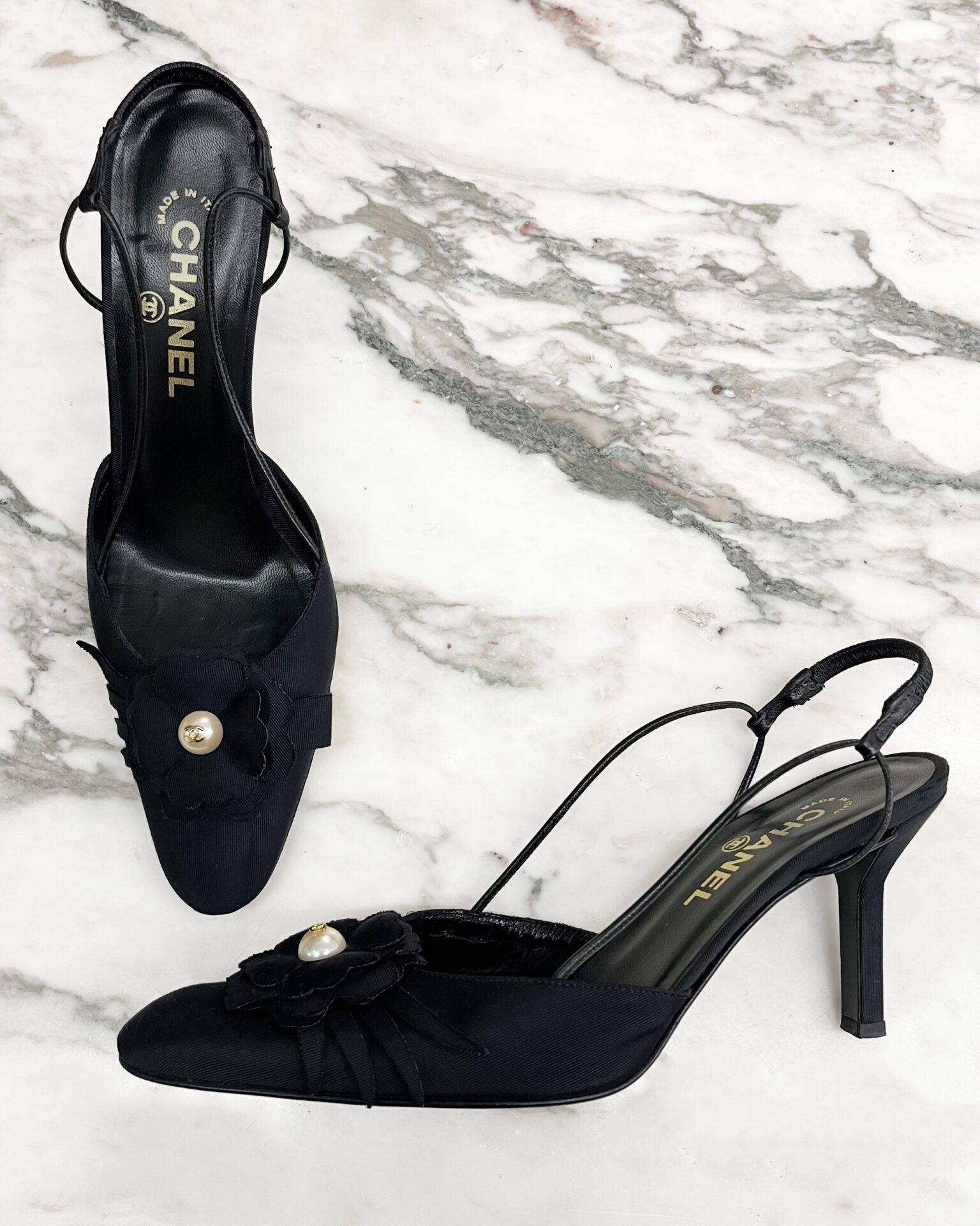 Chanel black slingback heels with Camellia and pearl