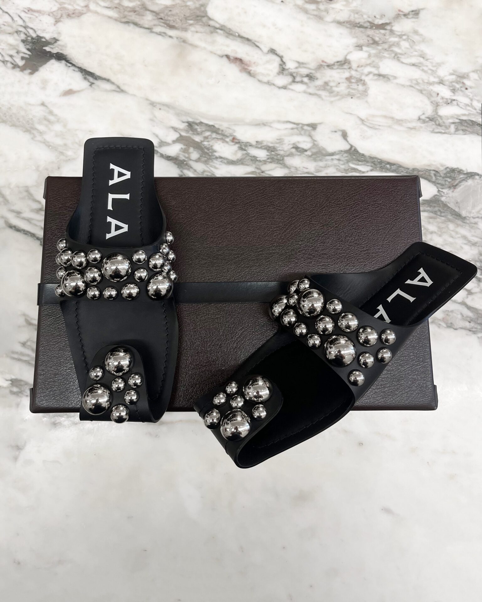 Alaia black folded embellished leather sandals