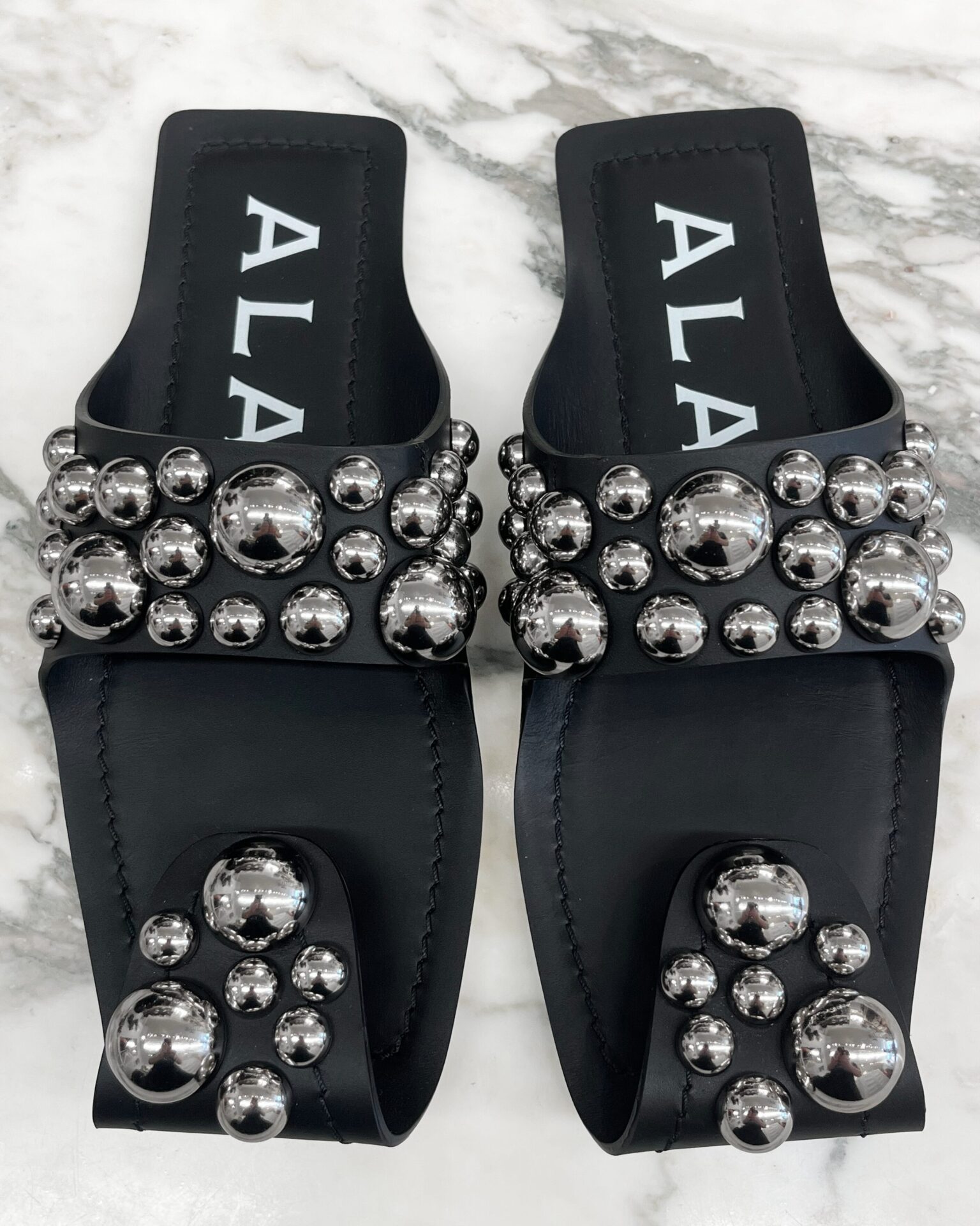 Alaia black folded embellished leather sandals