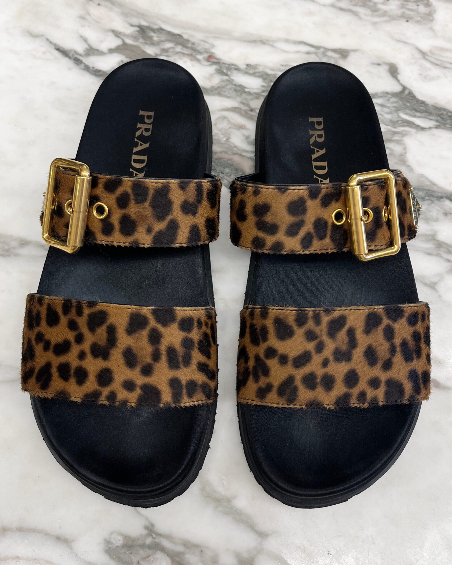 Prada pony hair leopard print sandals with triangle logo