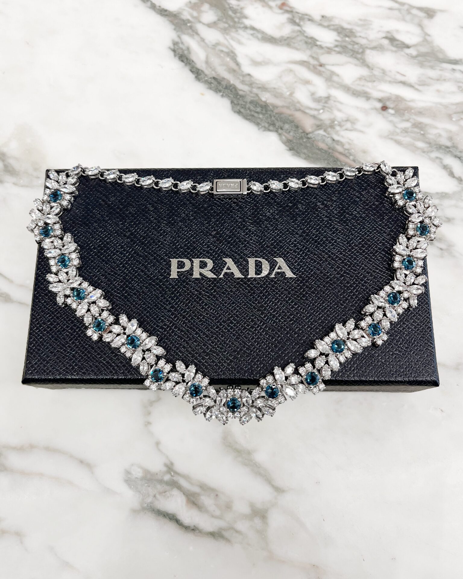 Prada clear & sapphire crystal necklace with logo clasp