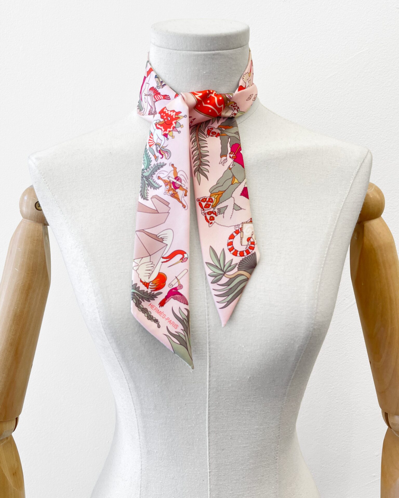 Hermes Academia Hippica twilly silk scarf in rose pink