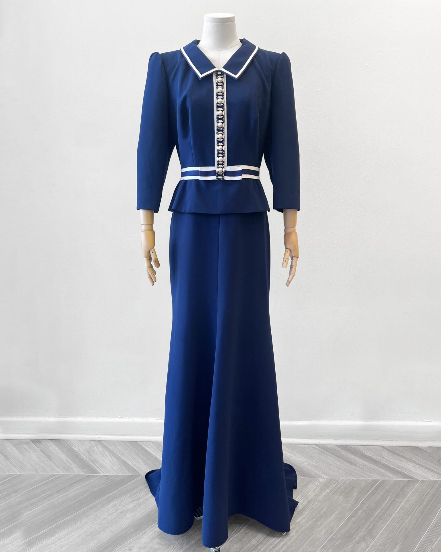 Jenny Packham 2025 navy gown with crystal & pearl front