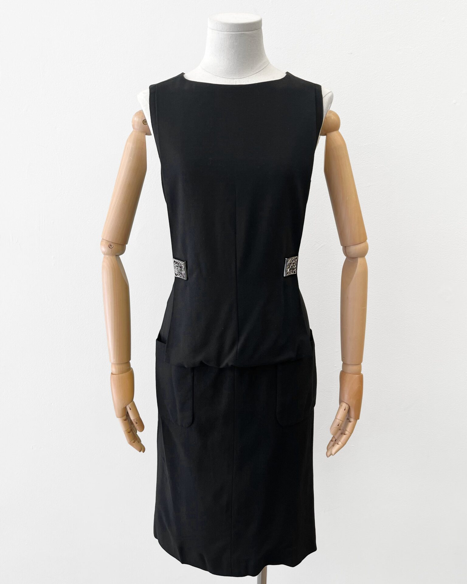 Chanel black sleeveless dress with front pockets and square buttons