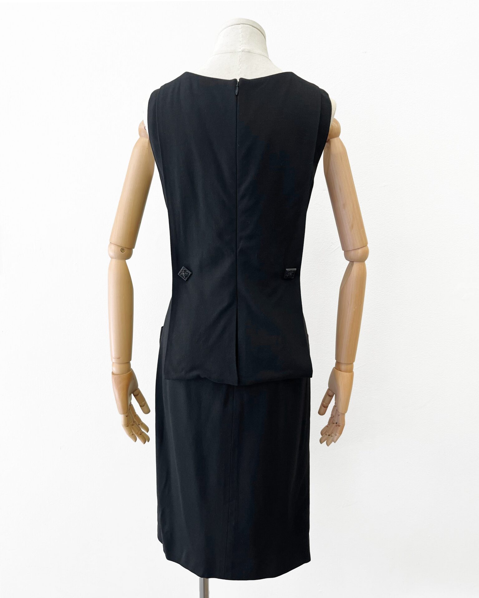 Chanel black sleeveless dress with front pockets and square buttons