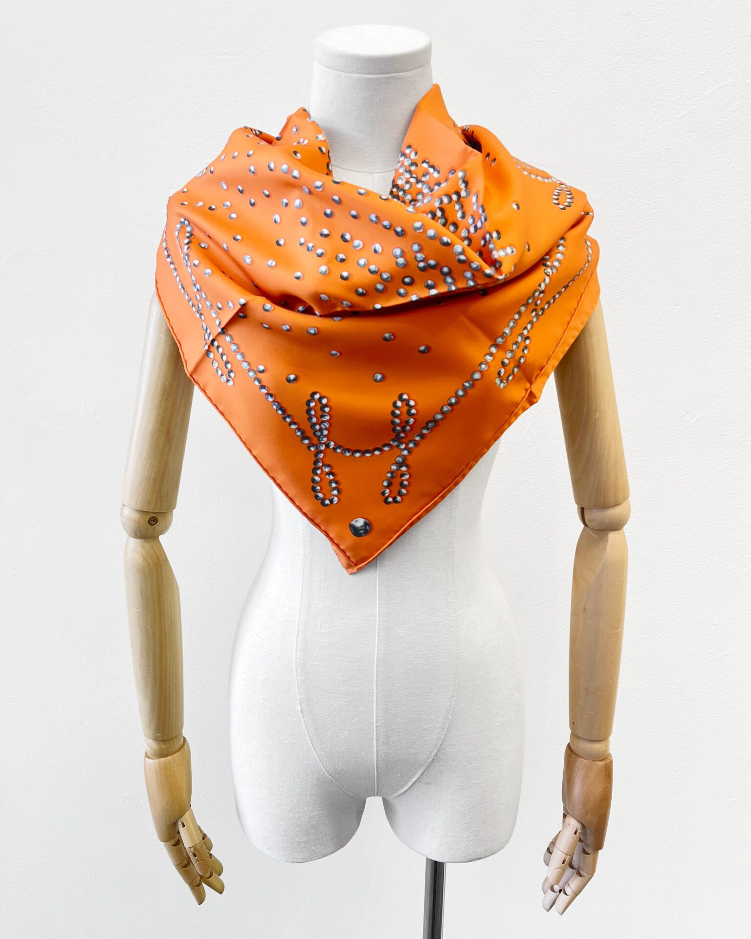 Hermes “Cheval de Legende” silk scarf in orange & grey
