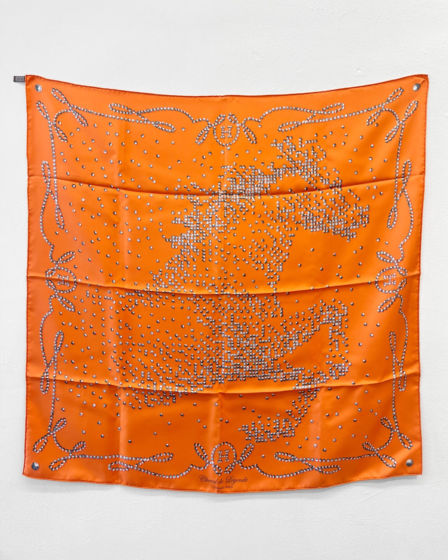 Hermes “Cheval de Legende” silk scarf in orange & grey