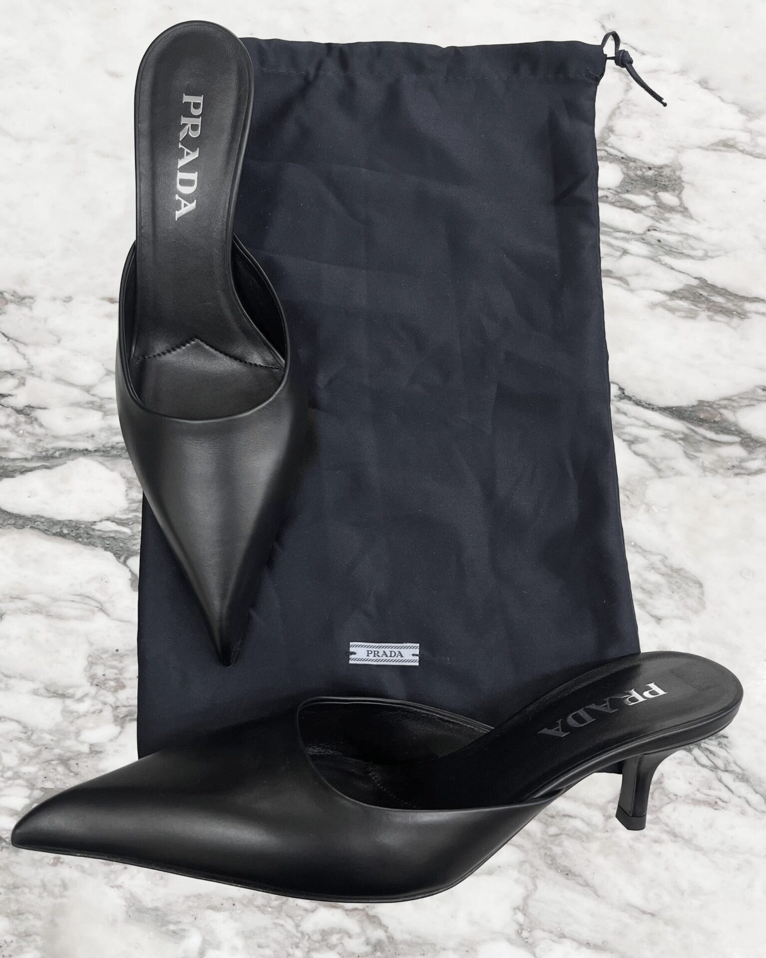 Prada black leather pointed toe kitten heel mules