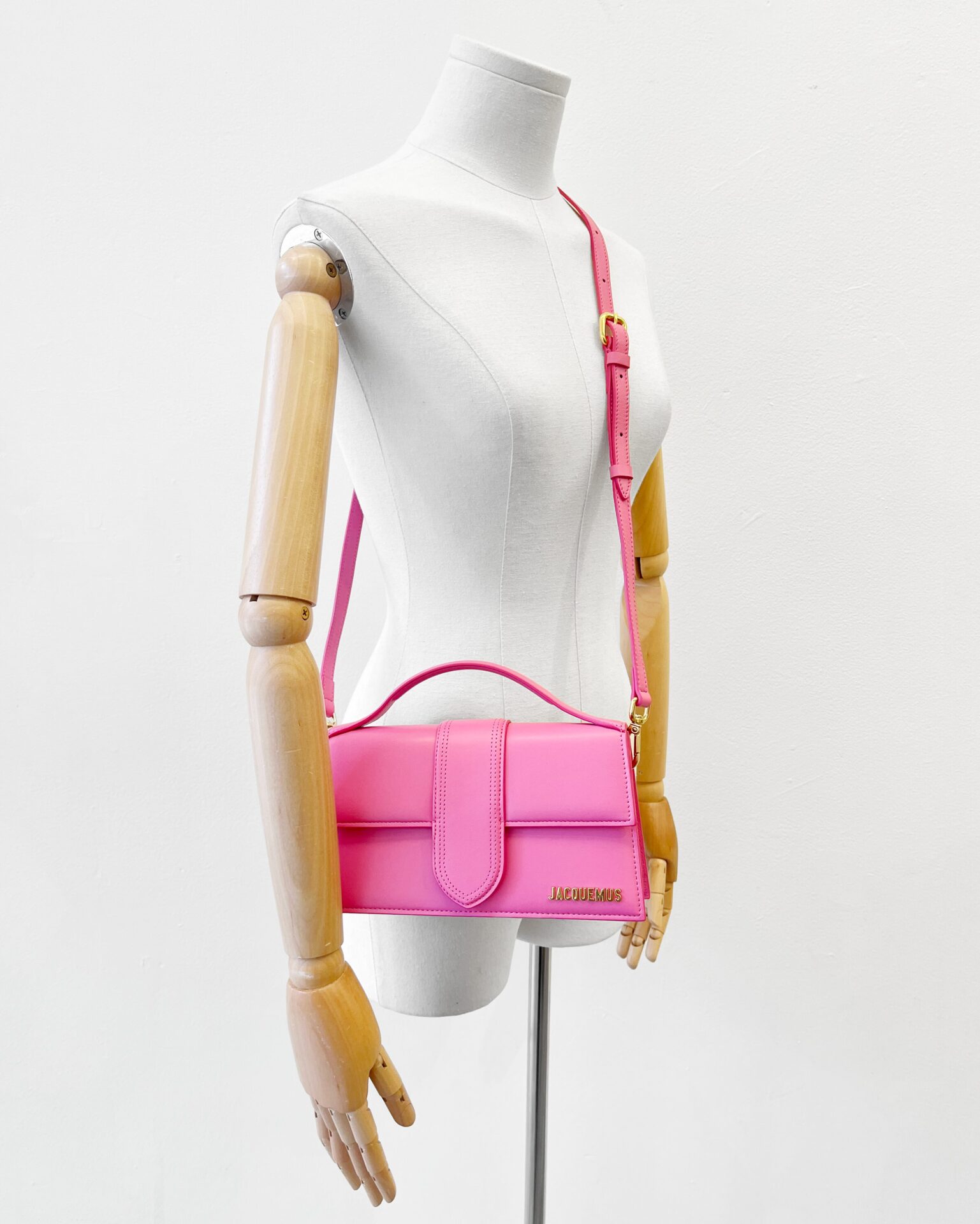 Jacquemus Le Grand Bambino purse in neon pink leather