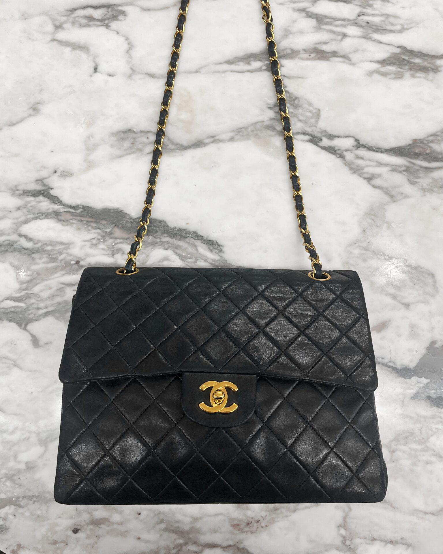 Chanel 1980’s black lambskin classic double flap with gold hardware