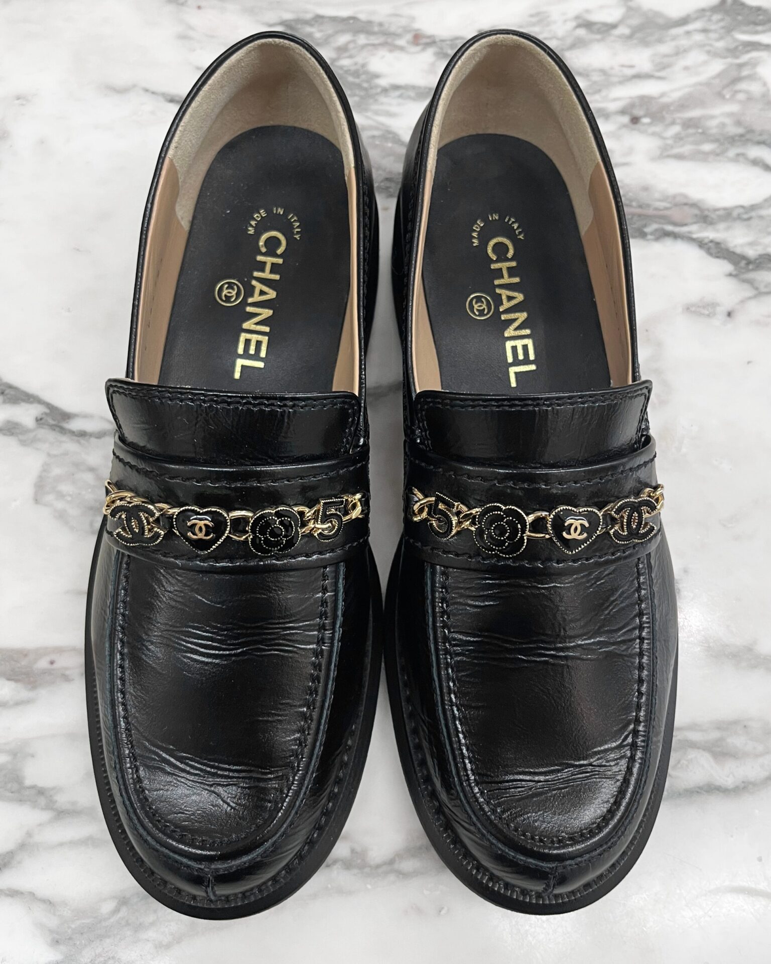 Chanel black calfskin loafers with chains