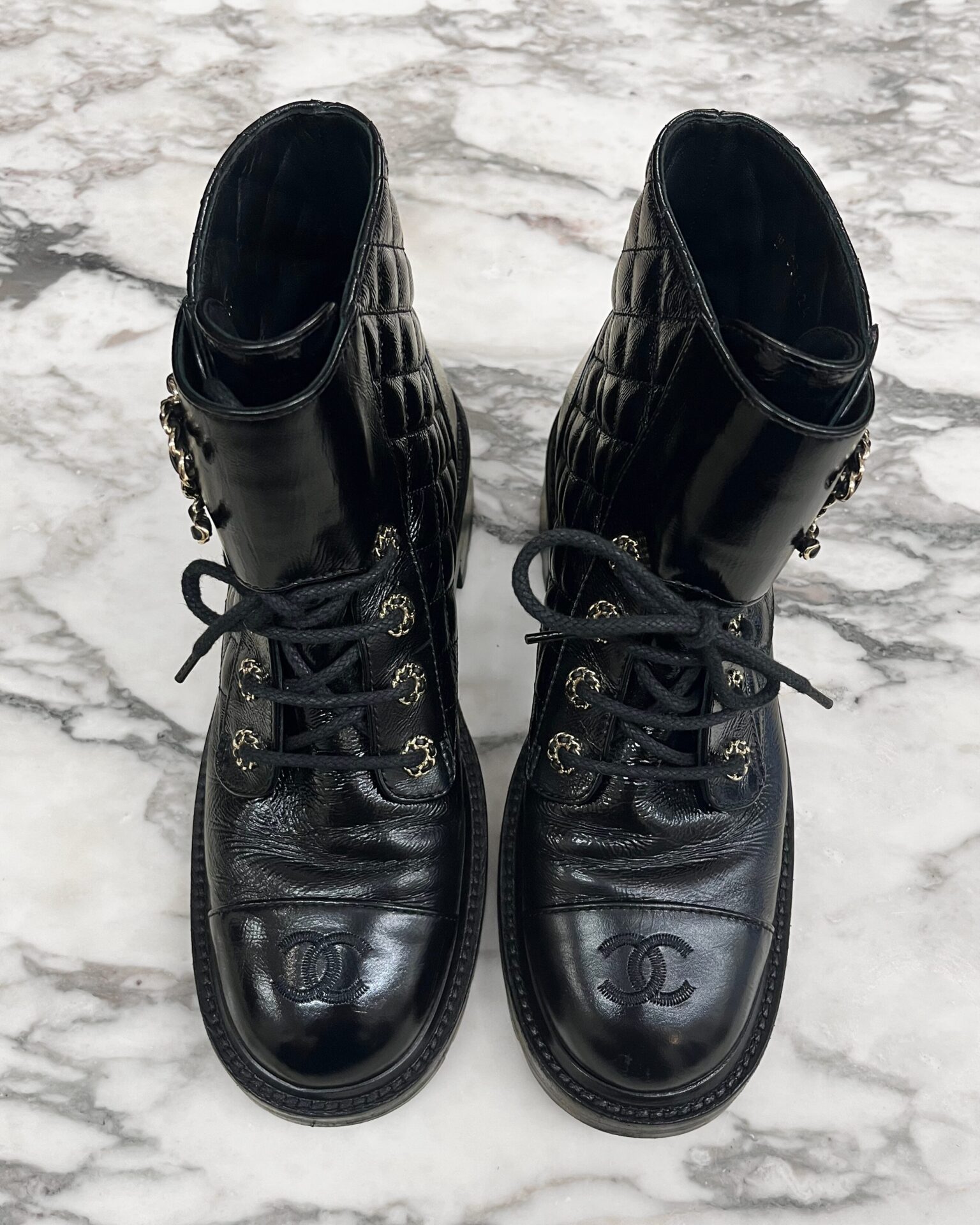 Chanel black quilted leather combat boots