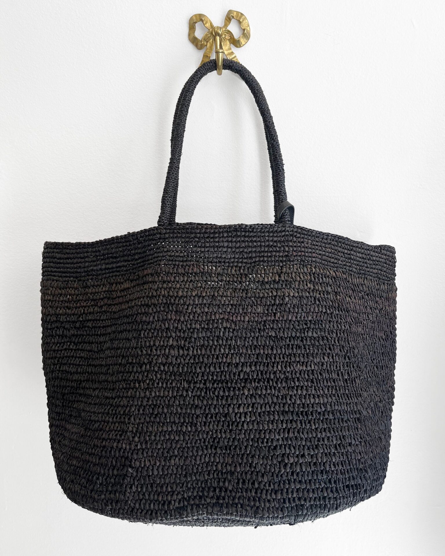 The Row raffia Oregon tote bag in black with pouch