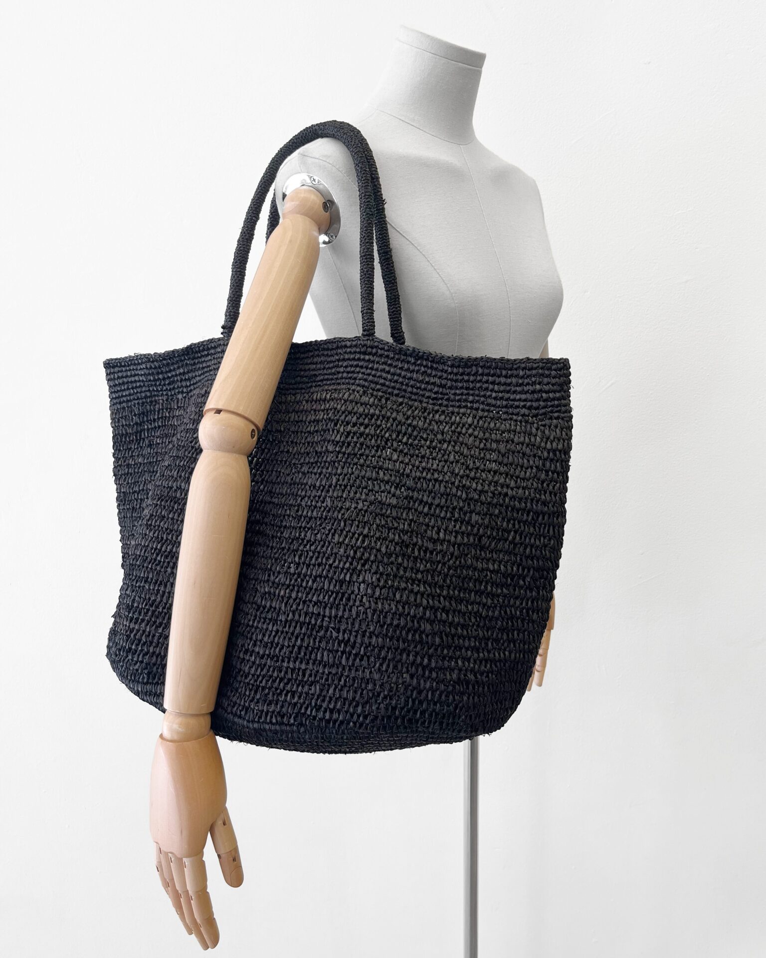 The Row raffia Oregon tote bag in black with pouch