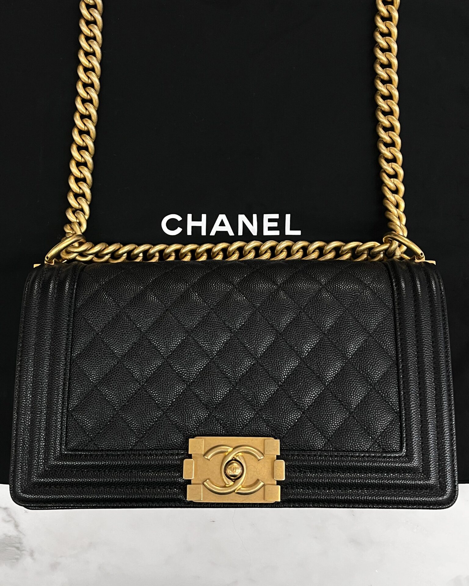 Chanel 2019 medium Boy bag in black caviar with gold hardware