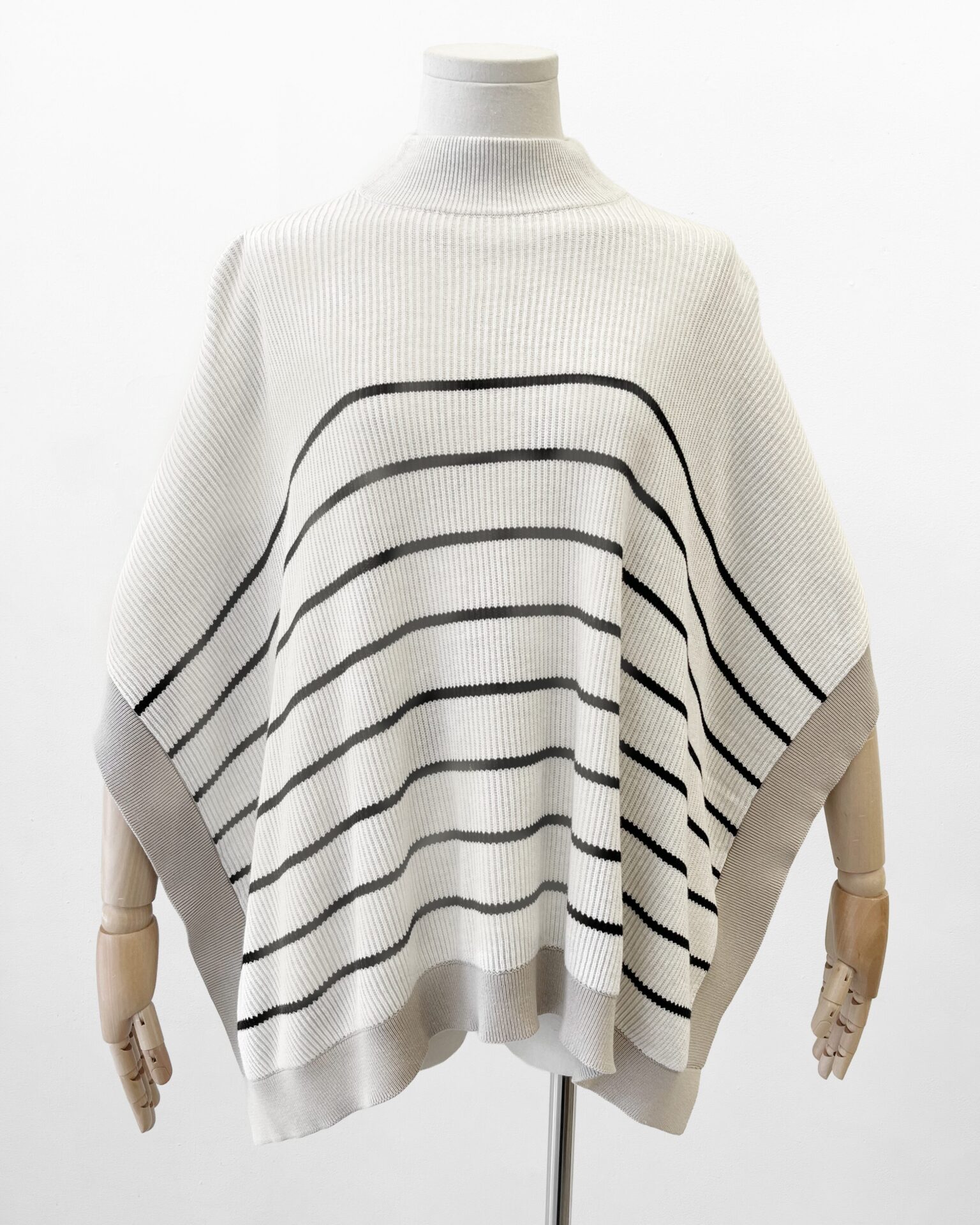 Brunello Cucinelli oatmeal with black stripe knit cotton poncho