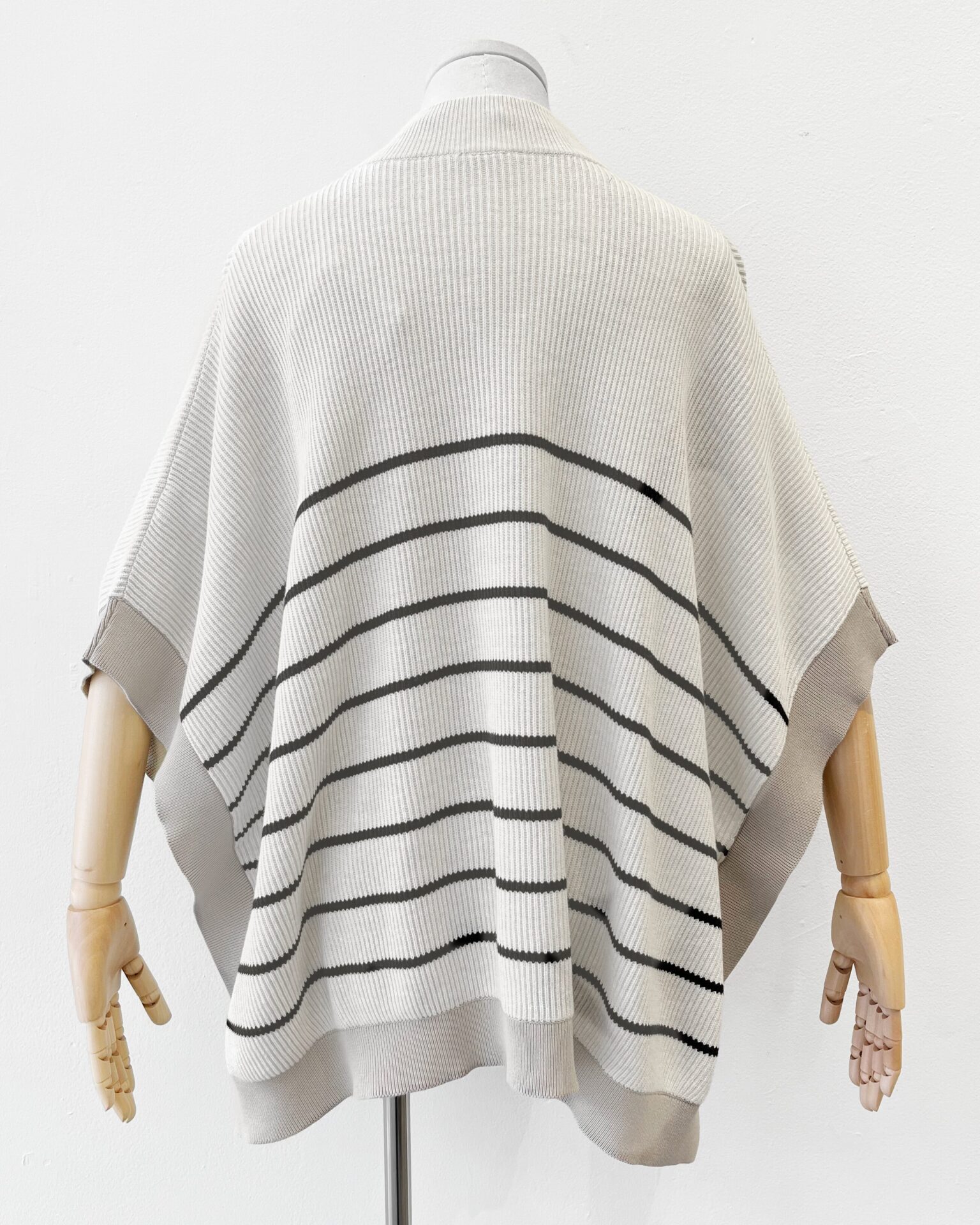 Brunello Cucinelli oatmeal with black stripe knit cotton poncho