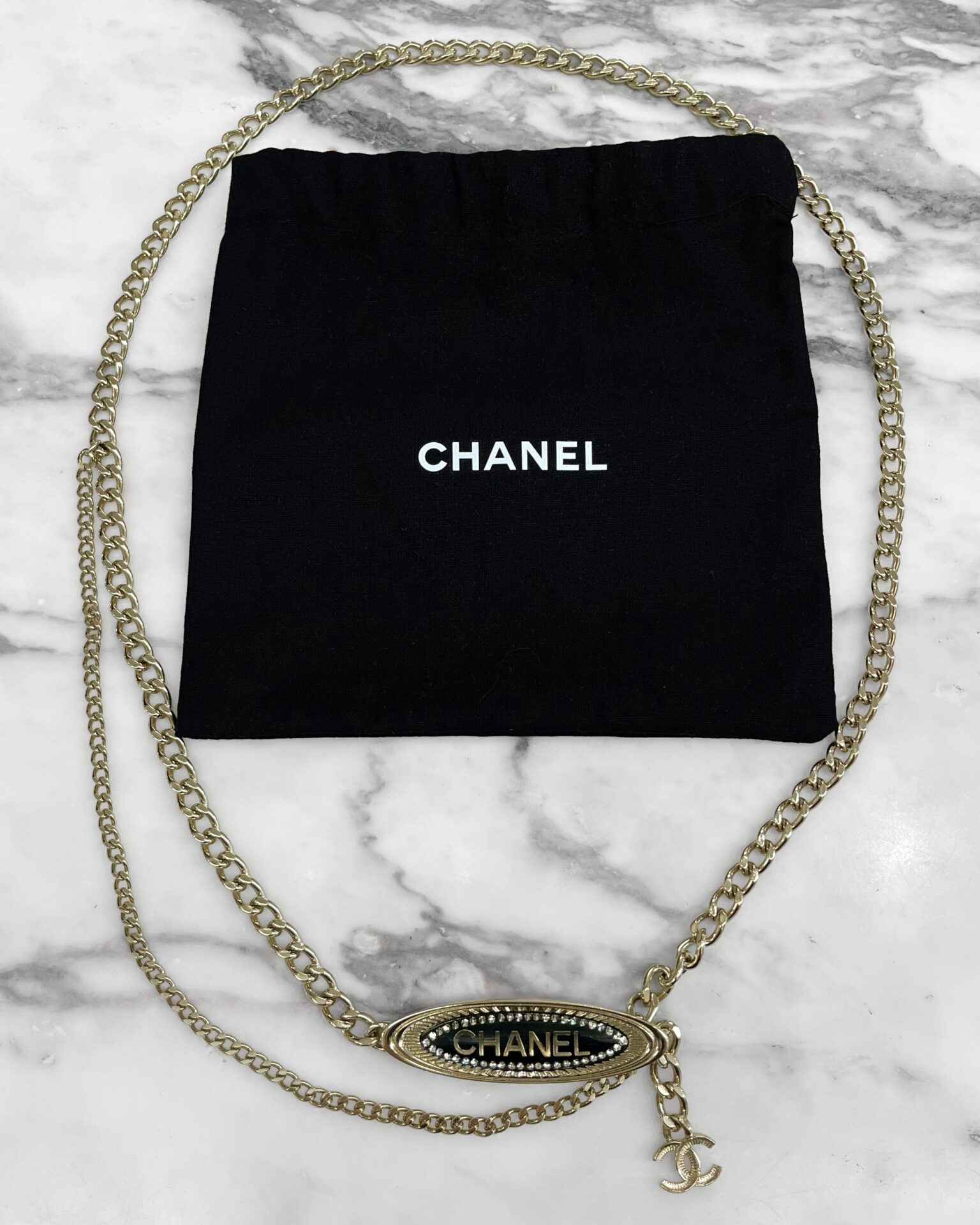 Chanel 2021 light gold chain belt with resin logo