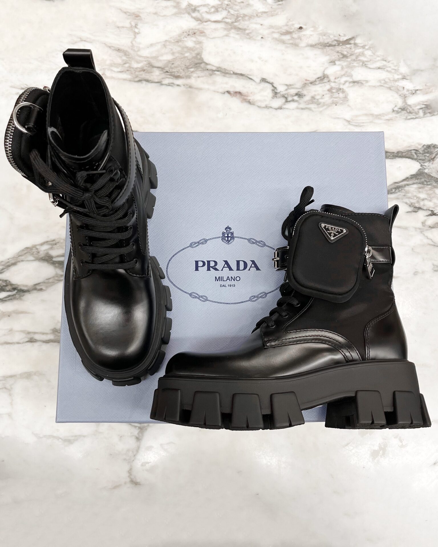 Prada Monolith leather & Re-Nylon boots with pouch