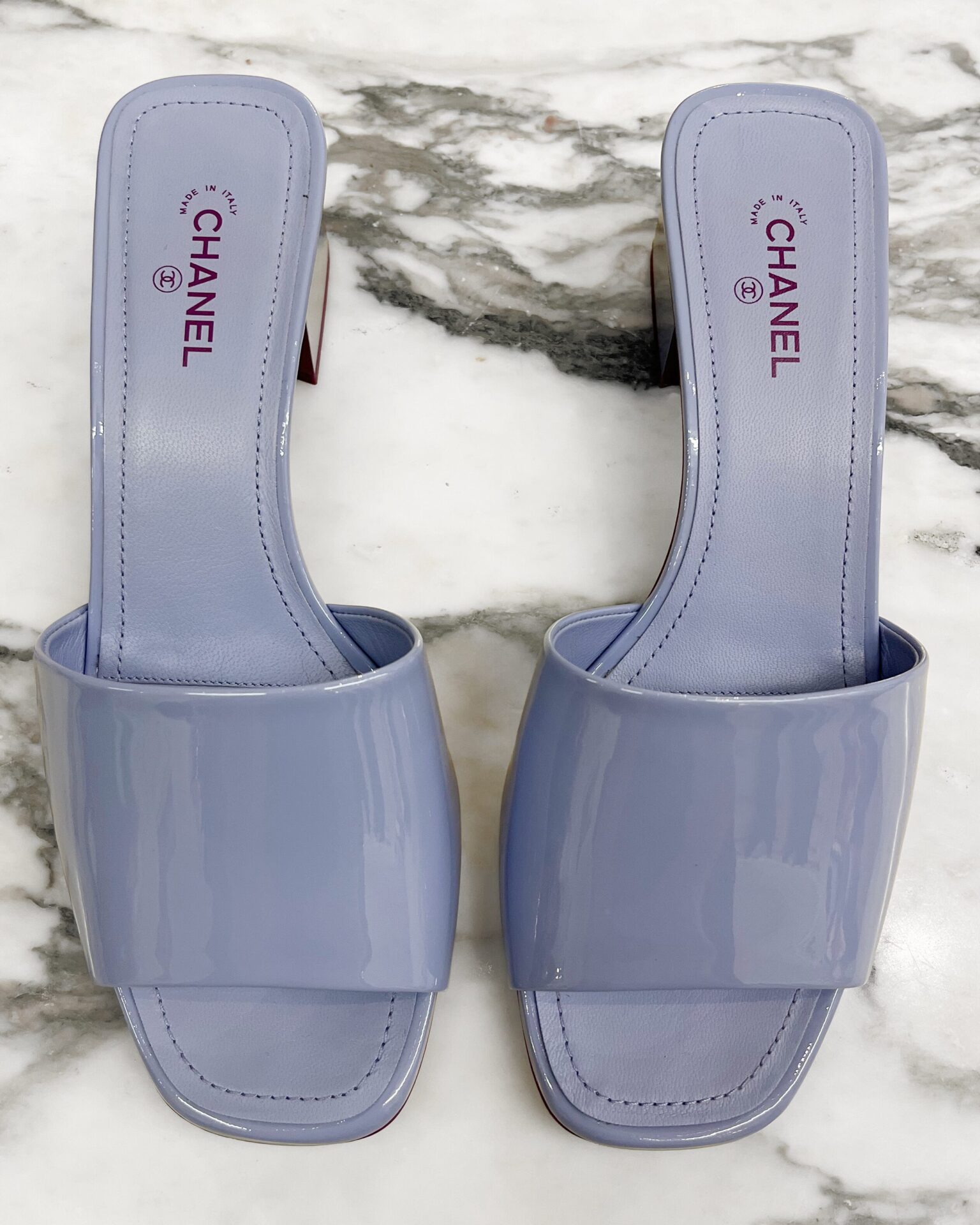 Chanel lavender patent leather mules with CC logo heels